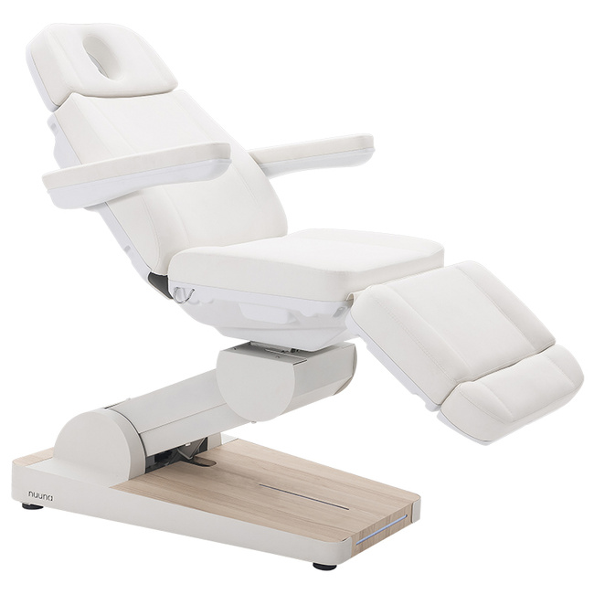 Fotel kosmetyczny WEELKO® NUUNA® CARE 4 z pełno ruchomym zagłówkiem i podświetlaną podstawą