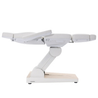 Fotel kosmetyczny WEELKO® NUUNA® CARE 4 z pełno ruchomym zagłówkiem i podświetlaną podstawą