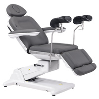 Fotel kosmetyczny WEELKO® SIMUS obrotowy 110° z podpórkami ginekologicznymi i pełno ruchomym zagłówkiem i sterowaniem nożnym