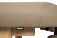 Łóżko do masażu WEELKO® ROOTS z bezową tapicerką