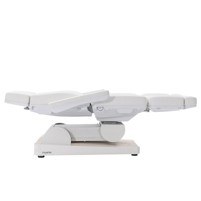 Fotel kosmetyczny WEELKO® NUUNA® CARE 4 z pełno ruchomym zagłówkiem i podświetlaną podstawą