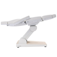 Fotel kosmetyczny WEELKO® NUUNA® CARE 4 z pełno ruchomym zagłówkiem i podświetlaną podstawą