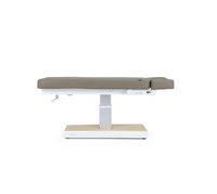 Beżowe łóżko kosmetyczne SPA WEELKO® NUUNA® FEEL 3 z podgrzewanym materacem sterowana pilotem i dotykowym ekranem sterującym