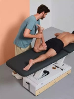 Leżanka kosmetyczna NAGGURA® SWOP 2L STARTER MASSAGE | Łóżko do fizykoterapii z pilotem i bezszwową tapicerką z technologią Permablok 3© odporną na bakterie, plamy i UV 