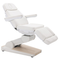 Fotel kosmetyczny WEELKO® NUUNA® CARE 4 z pełno ruchomym zagłówkiem i podświetlaną podstawą