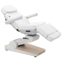 Fotel kosmetyczny WEELKO® NUUNA® CARE 4 PLUS obrotowy 180° z pełno ruchomym zagłówkiem i podświetleniem | bez lub z podgrzewanym materacem