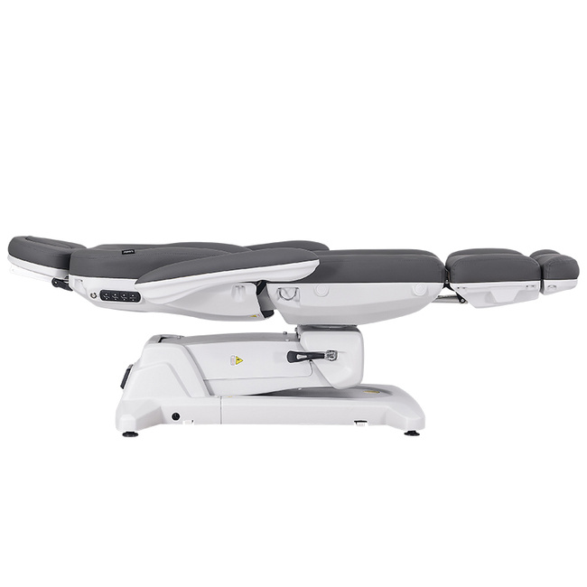 Fotel kosmetyczny WEELKO® SIMUS obrotowy 110° z podpórkami ginekologicznymi i pełno ruchomym zagłówkiem i sterowaniem nożnym