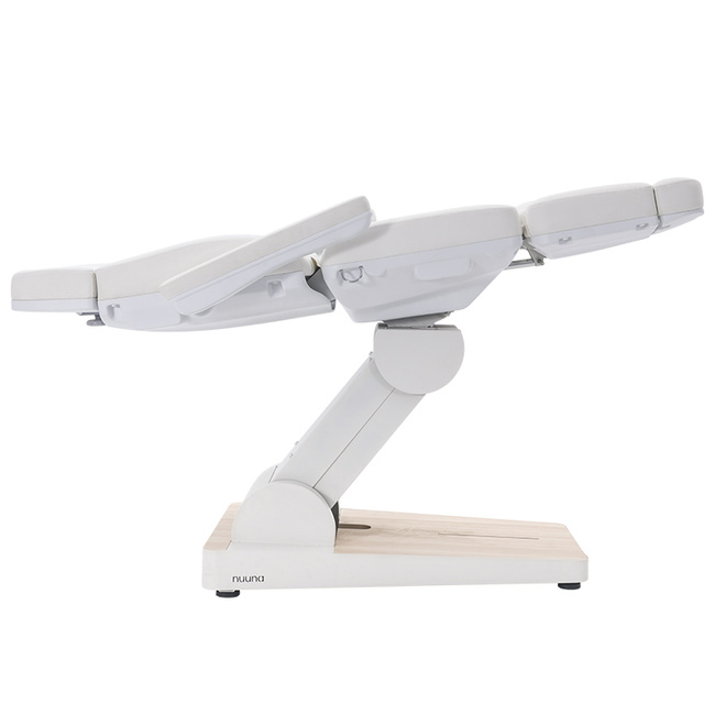 Fotel kosmetyczny WEELKO® NUUNA® CARE 4 z pełno ruchomym zagłówkiem i podświetlaną podstawą