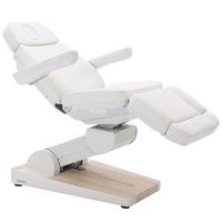 Fotel kosmetyczny WEELKO® NUUNA® CARE 4 z pełno ruchomym zagłówkiem i podświetlaną podstawą